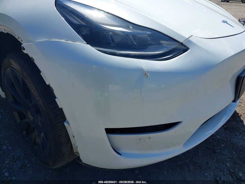 2023 Tesla Model y VIN 7SAYGDEE0PF598499 IAAI salvage auction — FRONT & REAR, Salvage Title, sold $8,100 on 2026-07-23 (photo 6)