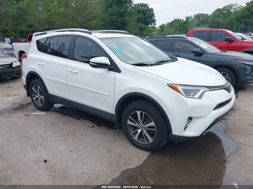 2018 Toyota Rav 4 VIN 2T3WFREV0JW458197 — IAAI salvage auction photo