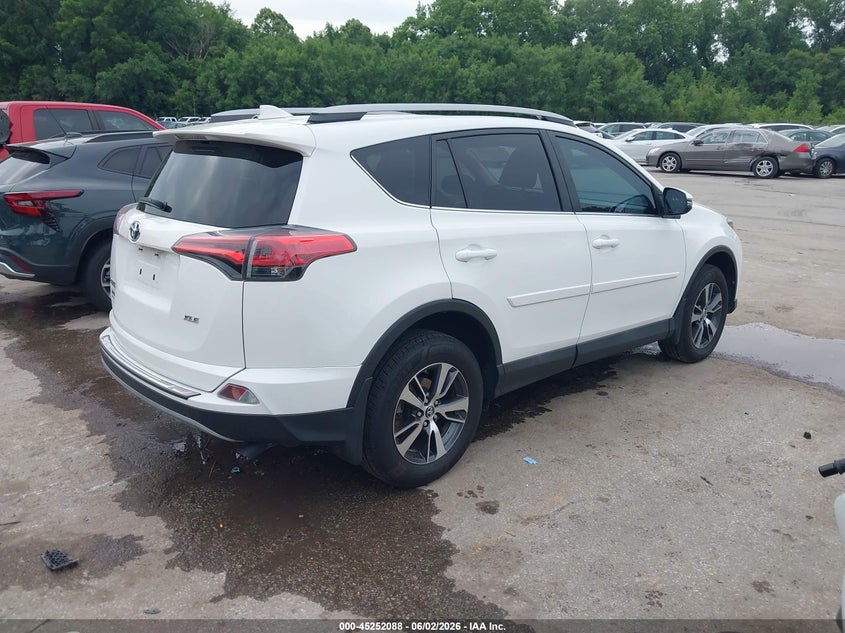 2018 Toyota Rav 4 VIN 2T3WFREV0JW458197 IAAI salvage auction — HAIL, Salvage Title, sold $5,700 on 2026-07-29 (photo 4)