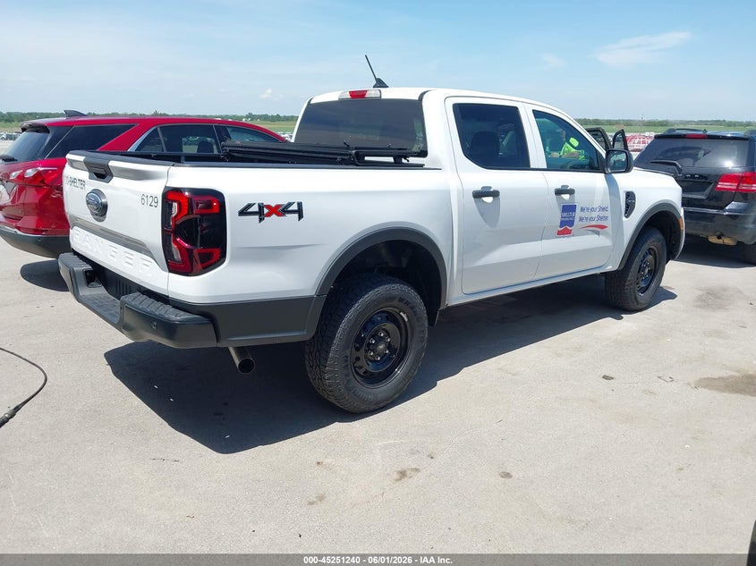 2026 Ford Ranger VIN 1FTER4PH5TLE09967 IAAI salvage auction — ENGINE DAMAGE, Salvage (Missouri), sold $12,700 on 2026-07-31 (photo 4)