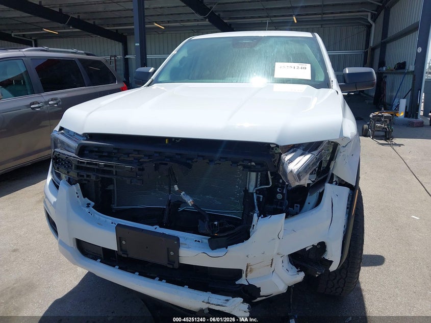 2026 Ford Ranger VIN 1FTER4PH5TLE09967 IAAI salvage auction — ENGINE DAMAGE, Salvage (Missouri), sold $12,700 on 2026-07-31 (photo 6)