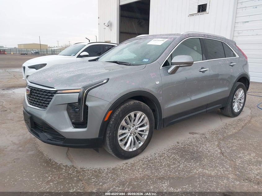 2024 Cadillac Xt4 VIN 1GYAZAR42RF127648 IAAI salvage auction — LEFT FRONT, Original (Texas), sold $14,000 on 2026-08-20 (photo 2)