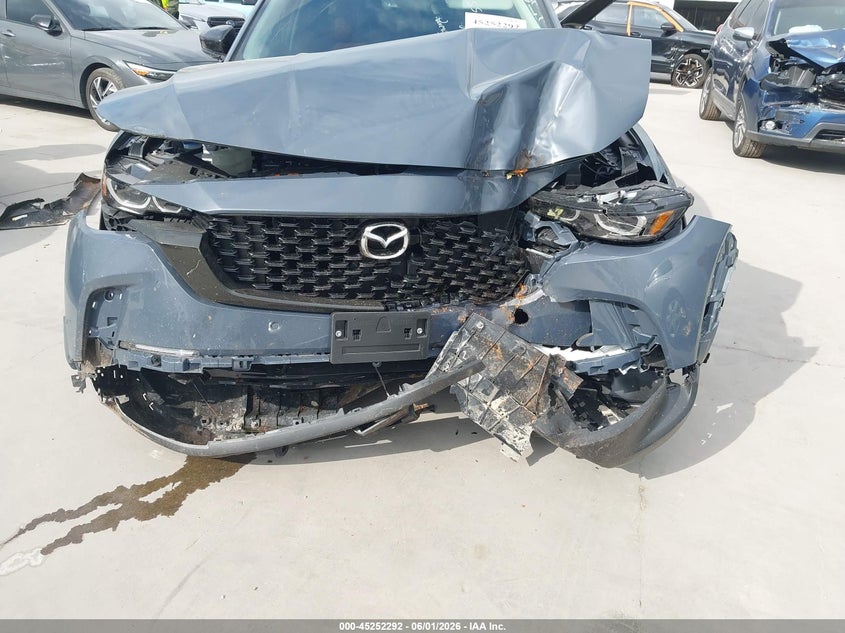 2026 Mazda Cx-50 VIN 7MMVAADW4TN156251 IAAI salvage auction — NORMAL WEAR, Salvage Title, sold $7,800 on 2026-07-14 (photo 6)