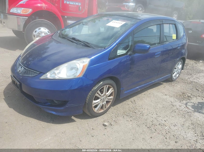 2009 Honda Fit VIN JHMGE884X9S044710 IAAI salvage auction — RIGHT SIDE, Salvage (Massachusetts), sold $1,000 on 2026-07-14 (photo 2)