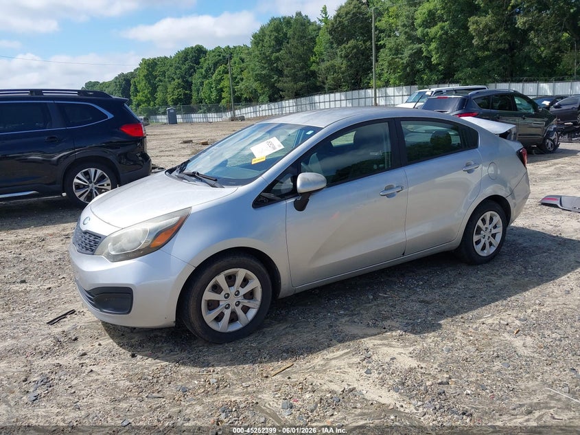 2013 Kia Rio VIN KNADM4A34D6209859 IAAI salvage auction — REAR END, Salvage Title, sold $750 on 2026-07-16 (photo 2)