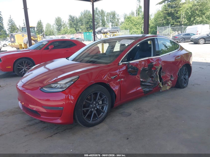 2018 Tesla Model 3 VIN 5YJ3E1EB6JF055098 IAAI salvage auction — LEFT SIDE, Salvage Title, sold $25 on 2026-07-30 (photo 2)