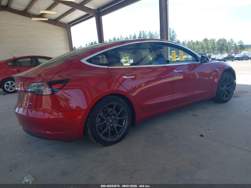 2018 Tesla Model 3 VIN 5YJ3E1EB6JF055098 IAAI salvage auction — LEFT SIDE, Salvage Title, sold $25 on 2026-07-30 (photo 4)