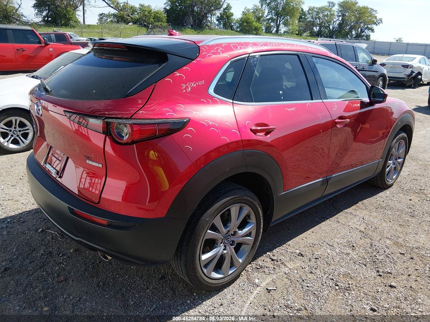 2023 Mazda Cx-30 VIN 3MVDMBDM4PM556784 IAAI salvage auction — HAIL, Salvage (Nebraska), sold $12,700 on 2026-07-30 (photo 4)