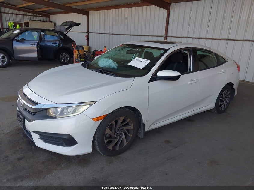 2016 Honda Civic VIN 19XFC2F71GE246753 IAAI salvage auction — LEFT SIDE, Salvage Title, sold $4,100 on 2026-07-09 (photo 2)