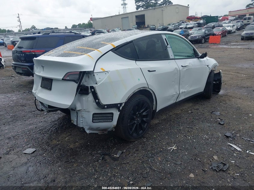 2021 Tesla Model y VIN 5YJYGDED9MF181396 IAAI salvage auction — REAR END, Salvage Title, sold $6,000 on 2026-07-09 (photo 4)