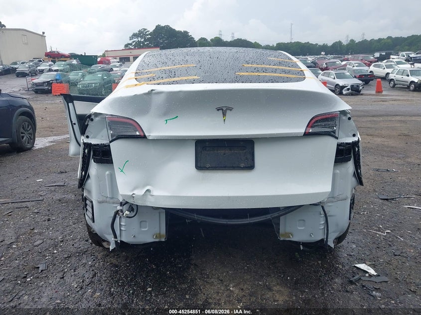 2021 Tesla Model y VIN 5YJYGDED9MF181396 IAAI salvage auction — REAR END, Salvage Title, sold $6,000 on 2026-07-09 (photo 6)