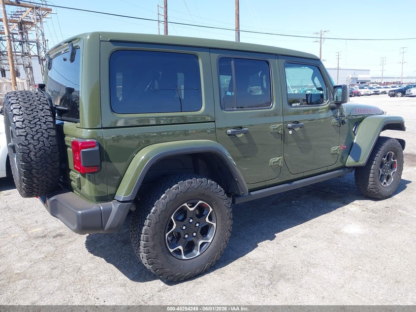 2023 Jeep Wrangler / VIN 1C4HJXFN7PW694866 IAAI salvage auction — LEFT REAR, Clear - Dealer Only (California), sold $24,350 on 2026-09-22 (photo 4)