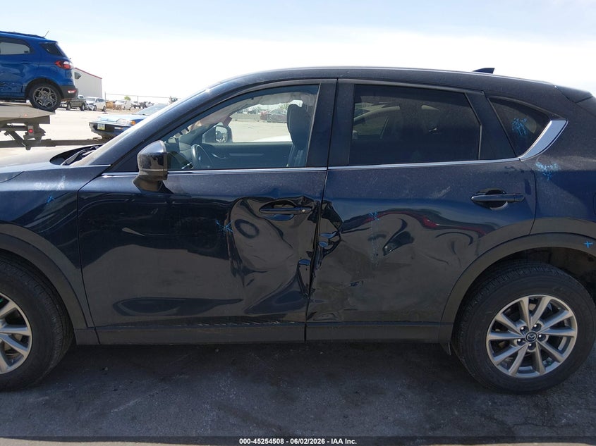 2022 Mazda Cx-5 VIN JM3KFBBMXN1548678 IAAI salvage auction — SIDE, Salvage Title, sold $6,150 on 2026-07-07 (photo 6)