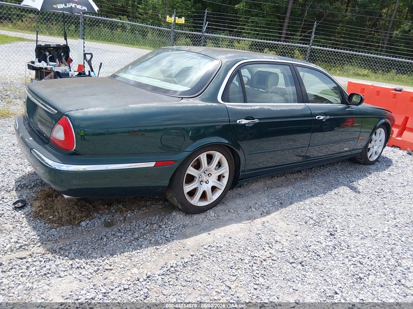 2005 Jaguar Xj VIN SAJWA82B75TG40835 IAAI salvage auction — NORMAL WEAR, Clear (Mississippi), sold $400 on 2026-07-10 (photo 4)
