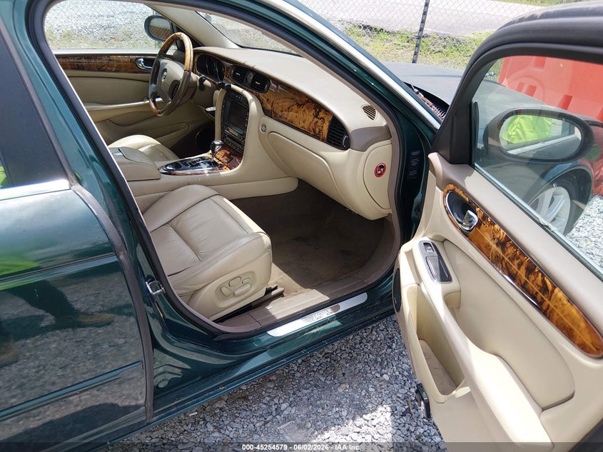 2005 Jaguar Xj VIN SAJWA82B75TG40835 IAAI salvage auction — NORMAL WEAR, Clear (Mississippi), sold $400 on 2026-07-10 (photo 5)