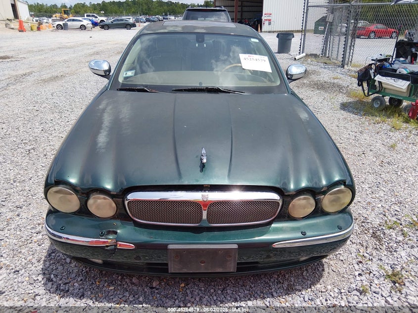 2005 Jaguar Xj VIN SAJWA82B75TG40835 IAAI salvage auction — NORMAL WEAR, Clear (Mississippi), sold $400 on 2026-07-10 (photo 6)
