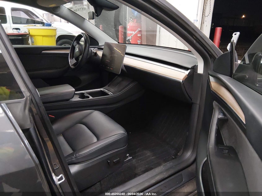 2023 Tesla Model y VIN 7SAYGAEE2PF791476 IAAI salvage auction — FRONT END, Salvage Title, sold $9,000 on 2026-07-16 (photo 5)