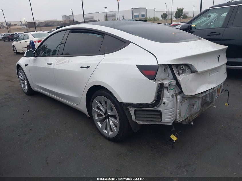 2022 Tesla Model 3 VIN 5YJ3E1EBXNF145361 IAAI salvage auction — REAR END, Salvage Title, sold $5,700 on 2026-07-12 (photo 3)