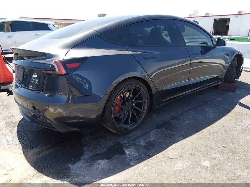 2025 Tesla Model 3 VIN 5YJ3E1ET0SF973262 IAAI salvage auction — FRONT & REAR, Salvage Title, sold $14,000 on 2026-07-31 (photo 4)