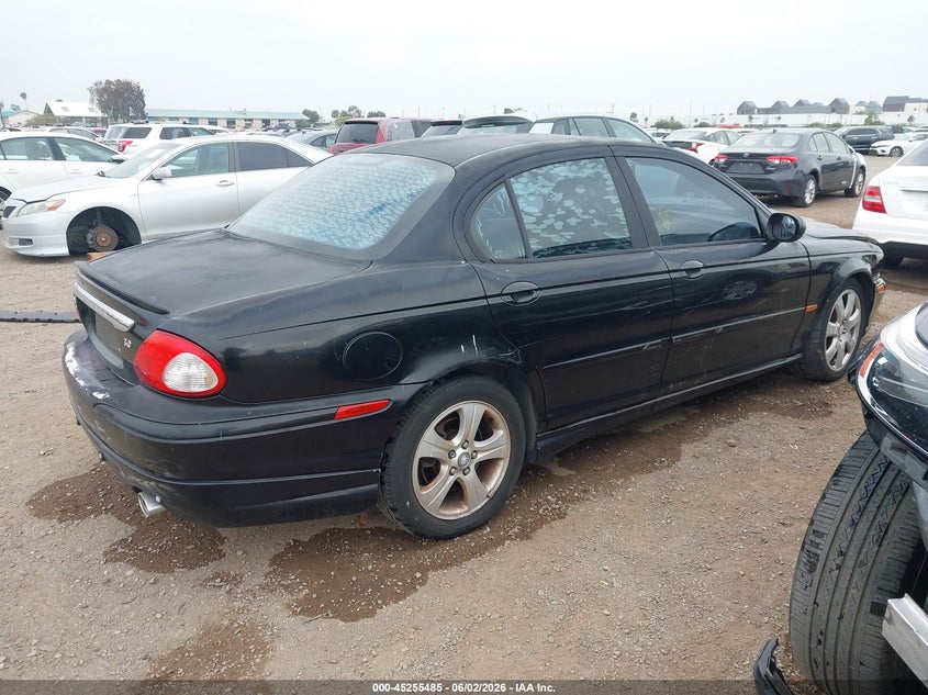 2006 Jaguar X type VIN SAJWA51A06WE78229 IAAI salvage auction — FRONT & REAR, Salvage (California), sold $325 on 2026-07-13 (photo 4)