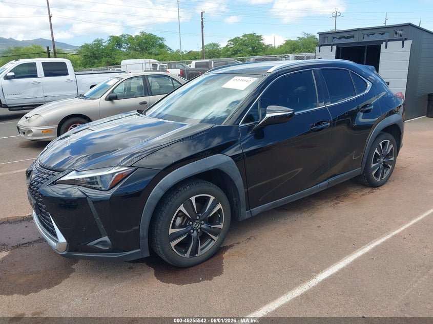 2023 Lexus Ux 250h VIN JTHX6JBH6P2134465 IAAI salvage auction — SIDE, Salvage (Hawaii), sold $9,750 on 2026-09-08 (photo 2)