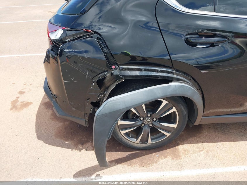 2023 Lexus Ux 250h VIN JTHX6JBH6P2134465 IAAI salvage auction — SIDE, Salvage (Hawaii), sold $9,750 on 2026-09-08 (photo 6)