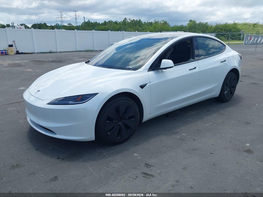 2026 Tesla Model 3 VIN 5YJ3E1EA6TF117965 IAAI salvage auction — Burn Interior, Salvage Title, sold $9,700 on 2026-08-02 (photo 2)