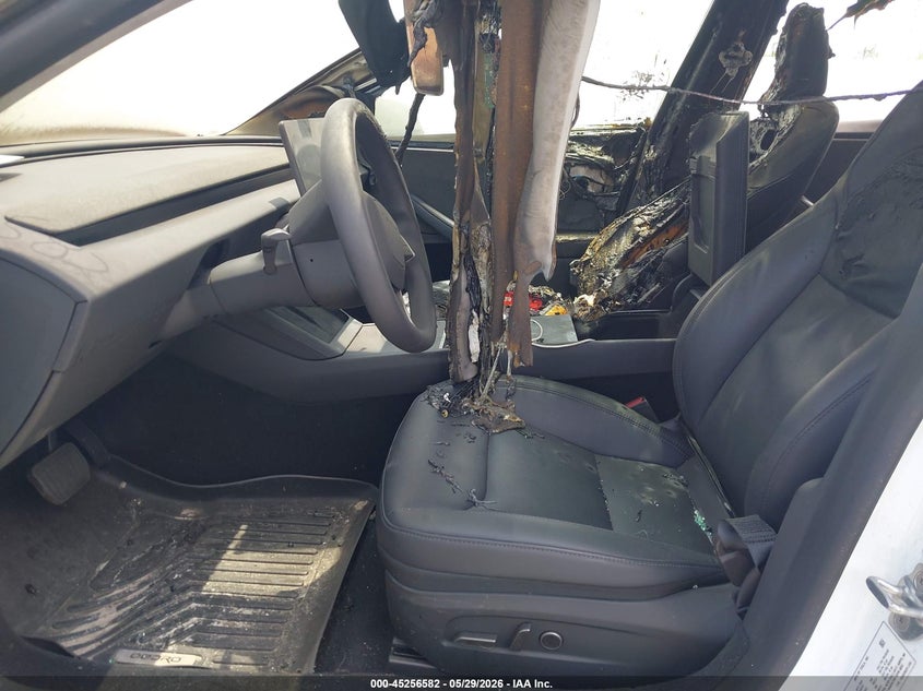 2026 Tesla Model 3 VIN 5YJ3E1EA6TF117965 IAAI salvage auction — Burn Interior, Salvage Title, sold $9,700 on 2026-08-02 (photo 5)