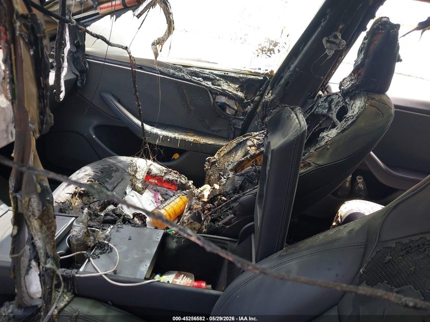 2026 Tesla Model 3 VIN 5YJ3E1EA6TF117965 IAAI salvage auction — Burn Interior, Salvage Title, sold $9,700 on 2026-08-02 (photo 6)