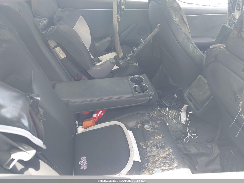 2026 Tesla Model 3 VIN 5YJ3E1EA6TF117965 IAAI salvage auction — Burn Interior, Salvage Title, sold $9,700 on 2026-08-02 (photo 7)