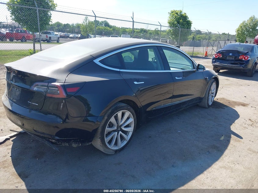 2020 Tesla Model 3 VIN 5YJ3E1EB8LF666169 IAAI salvage auction — LEFT SIDE, Salvage Title, sold $6,950 on 2026-07-16 (photo 4)