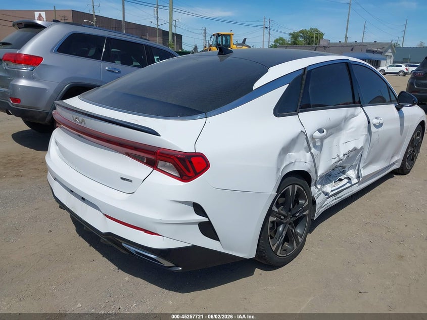 2023 Kia K5 VIN 5XXG64J21PG182188 IAAI salvage auction — SIDE, Salvage Title, sold $7,600 on 2026-08-23 (photo 4)