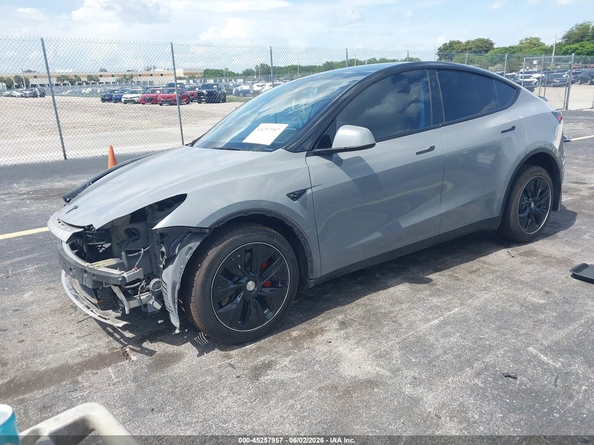 2024 Tesla Model y VIN 7SAYGDED5RF087509 IAAI salvage auction — RIGHT SIDE, Salvage Title, sold $10,975 on 2026-07-09 (photo 2)