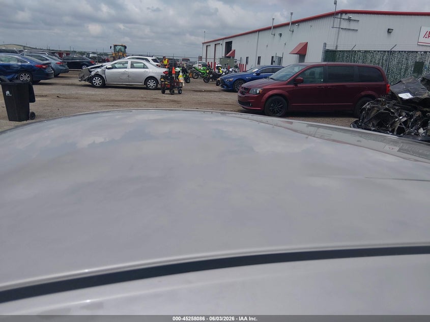 2026 Mazda 3 VIN JM1BPAKL9T1851522 IAAI salvage auction — HAIL, Salvage Title, sold $14,600 on 2026-08-27 (photo 6)