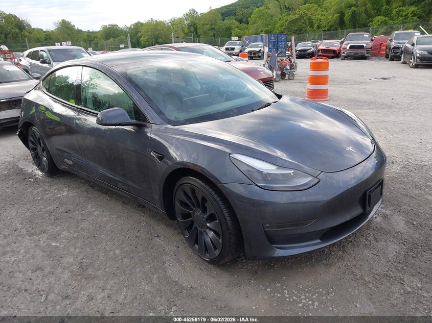 2022 Tesla Model 3 VIN 5YJ3E1EC8NF180330 IAAI salvage auction — REAR END, Salvage Title, sold $7,700 on 2026-07-09 (photo 1)