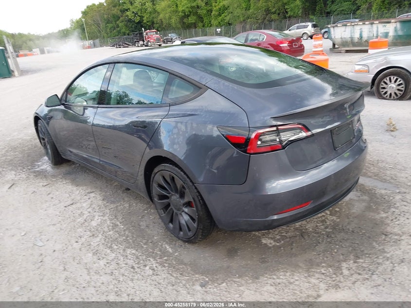 2022 Tesla Model 3 VIN 5YJ3E1EC8NF180330 IAAI salvage auction — REAR END, Salvage Title, sold $7,700 on 2026-07-09 (photo 3)