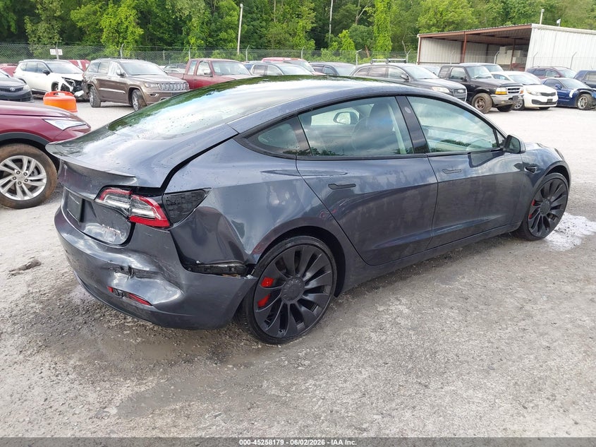 2022 Tesla Model 3 VIN 5YJ3E1EC8NF180330 IAAI salvage auction — REAR END, Salvage Title, sold $7,700 on 2026-07-09 (photo 4)