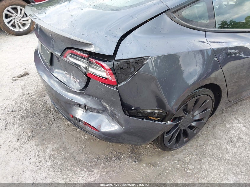 2022 Tesla Model 3 VIN 5YJ3E1EC8NF180330 IAAI salvage auction — REAR END, Salvage Title, sold $7,700 on 2026-07-09 (photo 6)