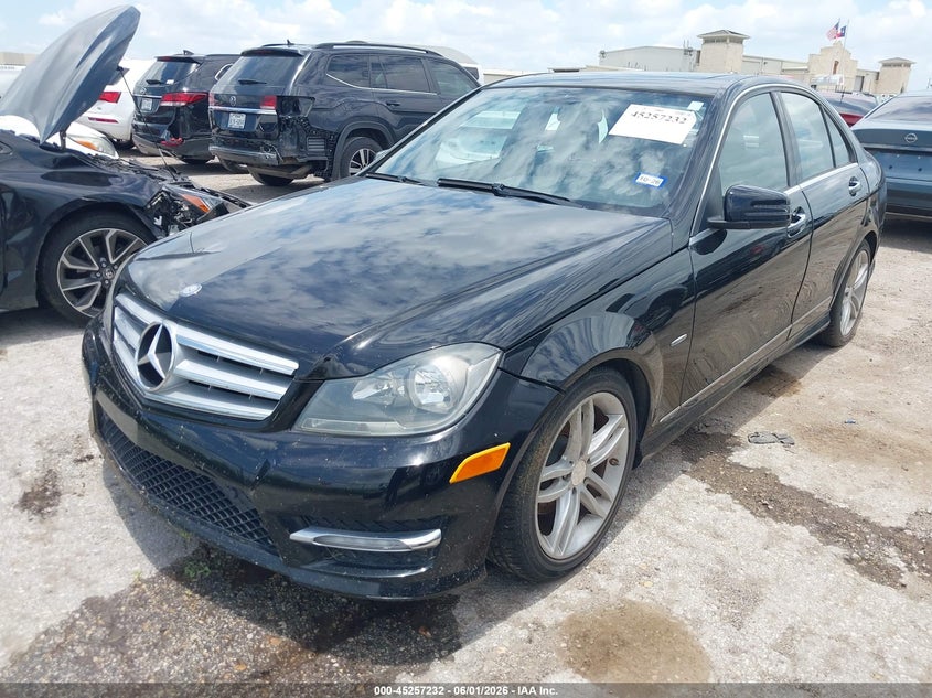 2012 Mercedes-benz VIN WDDGF4HB5CR203062 IAAI salvage auction — WATER/FLOOD, Salvage (Texas), sold $450 on 2026-08-17 (photo 2)