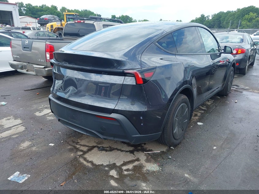 2026 Tesla Model y VIN 7SAYGDED0TA593866 IAAI salvage auction — REAR END, Salvage Title, sold $17,350 on 2026-07-23 (photo 4)
