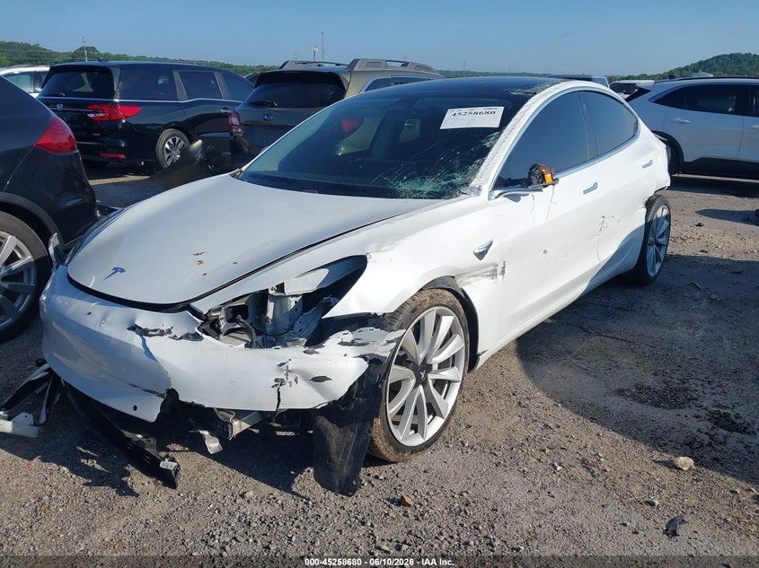 2020 Tesla Model 3 VIN 5YJ3E1EA5LF785708 IAAI salvage auction — FRONT & REAR, Salvage (Oklahoma), sold $2,950 on 2026-09-08 (photo 2)