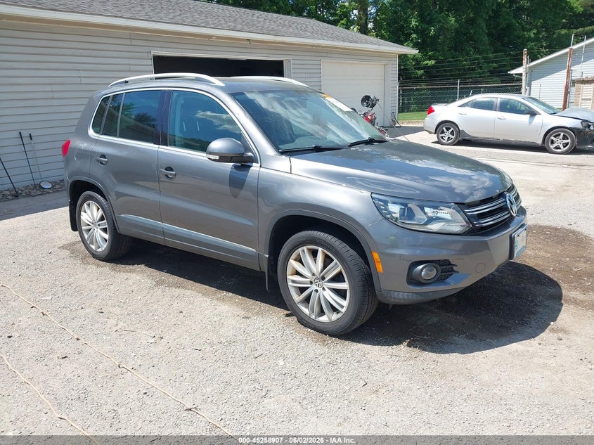 2016 Volkswagen Tiguan VIN WVGBV7AX9GW609167 IAAI salvage auction — HAIL, Salvage Title, sold $2,600 on 2026-07-13 (photo 1)