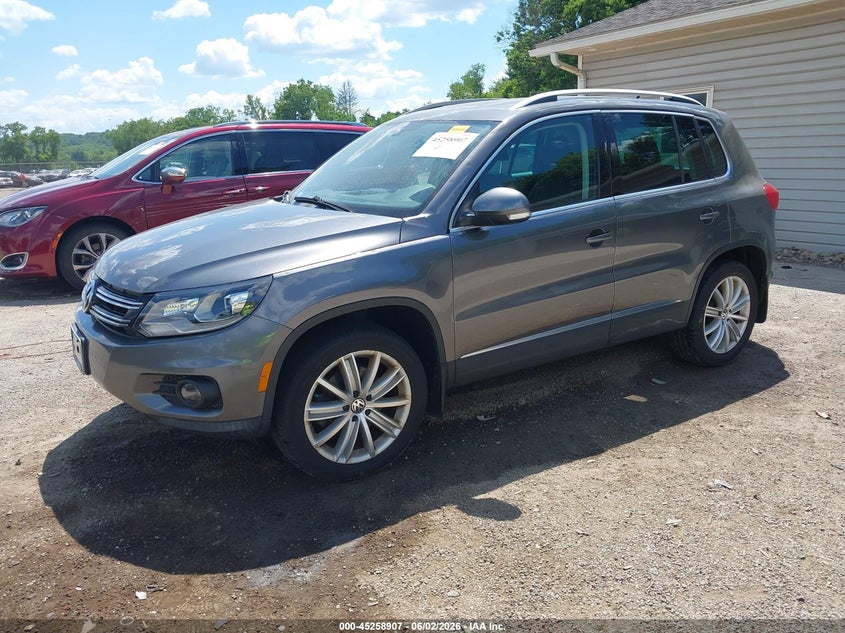 2016 Volkswagen Tiguan VIN WVGBV7AX9GW609167 IAAI salvage auction — HAIL, Salvage Title, sold $2,600 on 2026-07-13 (photo 2)