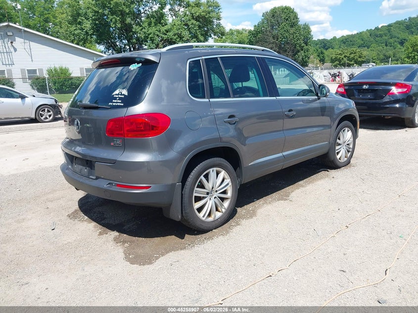 2016 Volkswagen Tiguan VIN WVGBV7AX9GW609167 IAAI salvage auction — HAIL, Salvage Title, sold $2,600 on 2026-07-13 (photo 4)