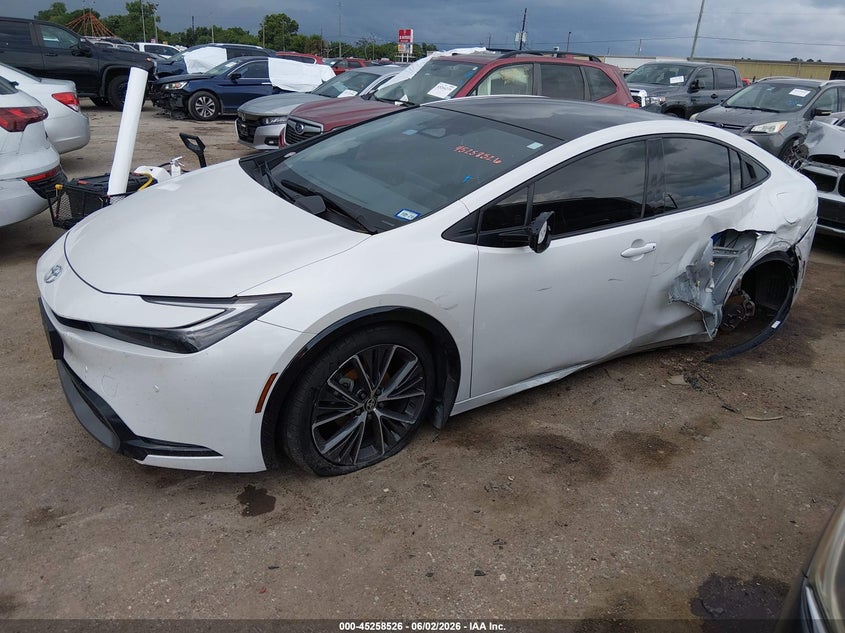 2024 Toyota Prius VIN JTDACAAU9R3035991 IAAI salvage auction — SIDE, Salvage Title, sold $12,600 on 2026-07-22 (photo 2)