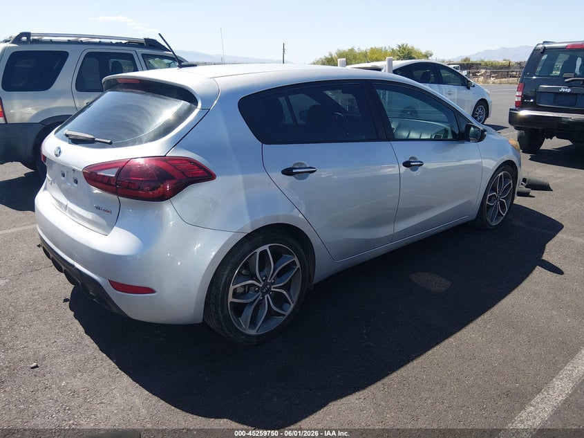 2015 Kia Forte VIN KNAFZ5A38F5396502 IAAI salvage auction — NORMAL WEAR, Clear (Utah), sold $350 on 2026-07-17 (photo 4)