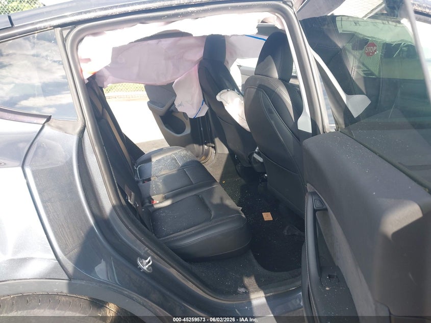 2023 Tesla Model y VIN 7SAYGDEE1PA092029 IAAI salvage auction — ALL OVER, Salvage Title, sold $3,950 on 2026-07-23 (photo 8)