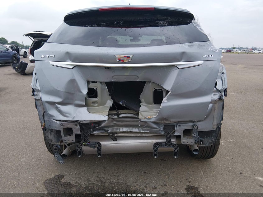 2025 Cadillac Xt5 VIN 1GYKNCRS8SZ119195 IAAI salvage auction — REAR END, Salvage Title, sold $9,600 on 2026-08-21 (photo 6)