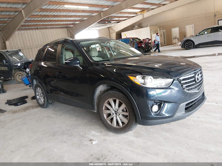 2016 Mazda Cx-5 VIN JM3KE4CY1G0608842 IAAI salvage auction — LEFT SIDE, Salvage Title, sold $2,050 on 2026-07-06 (photo 1)