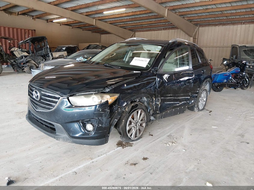 2016 Mazda Cx-5 VIN JM3KE4CY1G0608842 IAAI salvage auction — LEFT SIDE, Salvage Title, sold $2,050 on 2026-07-06 (photo 2)